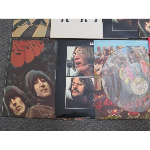 209 - FOURTEEN BEATLES RECORDS TO INCLUDE HARD DAYS NIGHT MONO PMC 1230, Please Please Me Stereo, PCS 3042... 