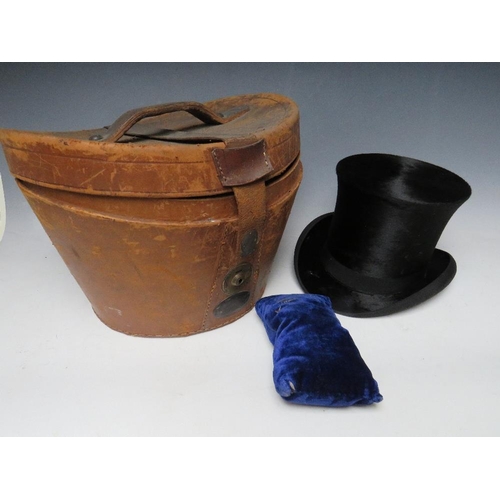 213 - A VINTAGE LEATHER TOP HAT CASE WITH SILK TOP HAT, A/FCondition Report:Loss of silk to the brim of ha... 