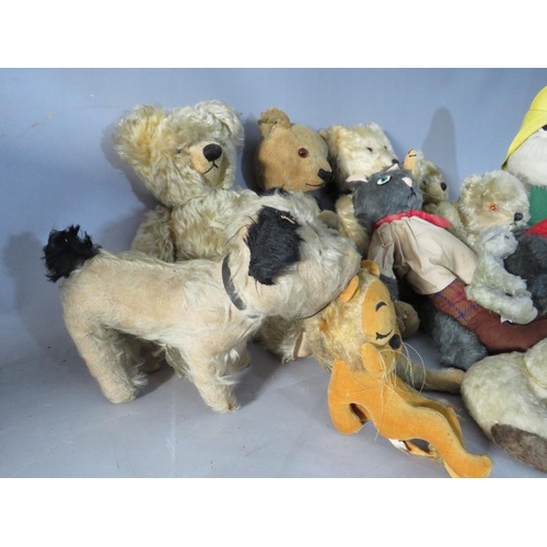 221 - A COLLECTION OF ELEVEN VINTAGE / ANTIQUE BEARS, to include examples by Chad Valley, plus a Japanese ... 