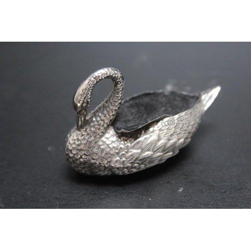 230 - A HALLMARKED SILVER NOVELTY PIN CUSHION IN THE FORM OF A SWAN BY ADIE AND LOVEKIN LTD  - BIRMINGHAM ... 