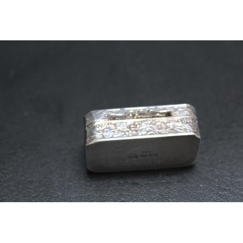 234 - A MODERN CONTINENTAL STYLE SILVER PILL BOX, with import hallmarks, decorated with typical neoclassic... 