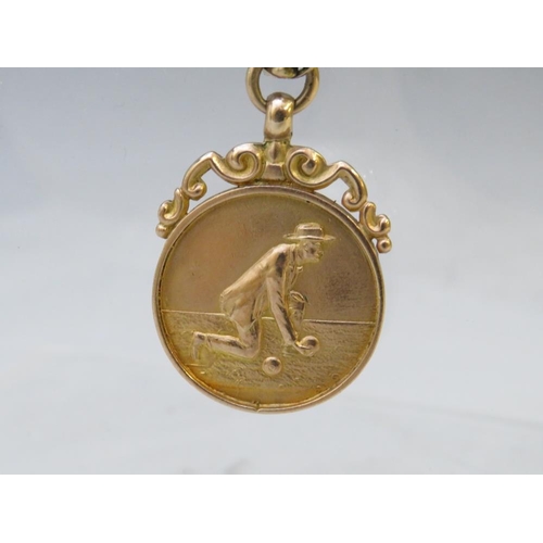 249 - A HALLMARKED 9CT GOLD BOWLS MEDAL, suspended on a 9ct gold belcher chain, approx combined weight 18.... 