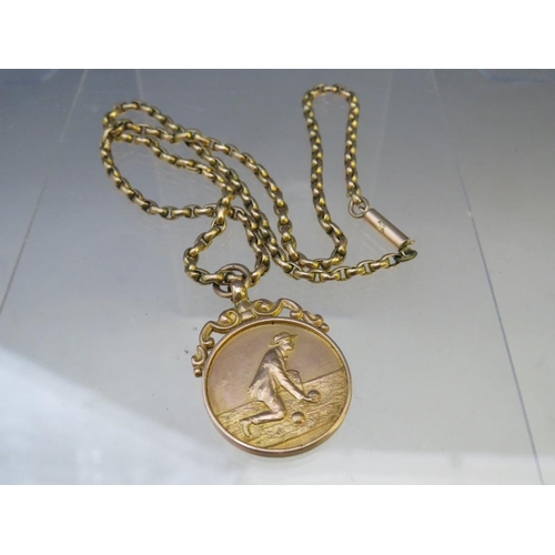 249 - A HALLMARKED 9CT GOLD BOWLS MEDAL, suspended on a 9ct gold belcher chain, approx combined weight 18.... 