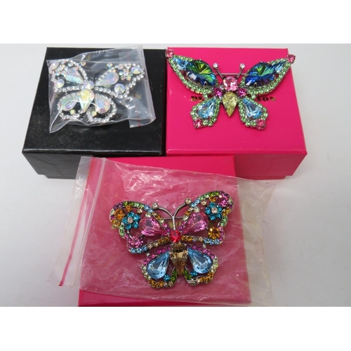 258 - A COLLECTION OF FIVE BUTLER AND WILSON JEWELLERY ITEMS, to include four butterfly themed brooches, l... 