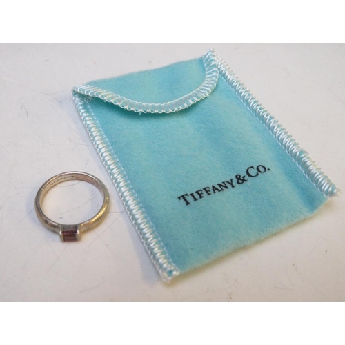 265 - THREE ITEMS OF TIFFANY & Co. 925 SILVER JEWELLERY, comprising a gemset silver ring - size N, a pair ... 