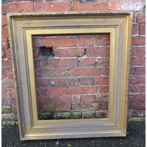 30 - A 19TH CENTURY GILT RECTANGULAR PICTURE FRAME, with moulded detail, slip rebate, 65 x 55 cm