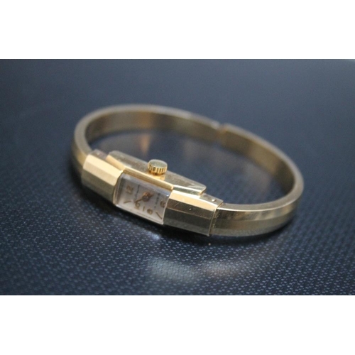 344 - A CONTINENTAL 585 GOLD CLASP BANGLE WRIST WATCH, approx weight 17.1g, W 1 cmCondition Report:ticks o... 
