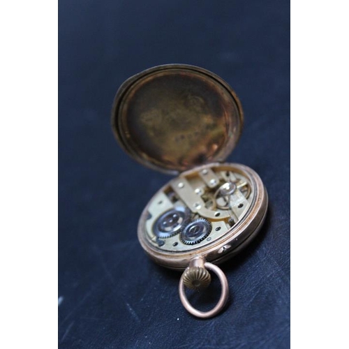 348 - A HALLMARKED 12 CARAT GOLD FOB WATCH, Dia 3 cm,Condition Report:ticks on winding - working capacity ... 