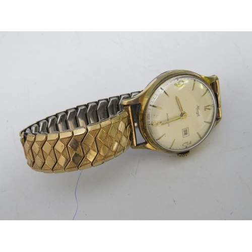 350 - TWO VINTAGE WRIST WATCHES, comprising a Kienzle day / date watch, together with a Mudu day / date do... 