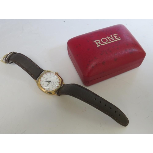 351 - A VINTAGE RONE 9CT GOLD ART DECO STYLE WRIST WATCH, on leather strap, boxed, dial Dia. 2.5 cm