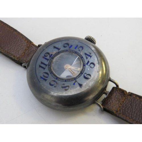 352 - A WW1 SILVER CASED HALF HUNTER TRENCH WRISTWATCH, with leather strap, visible dial Dia. .75 cm, case... 