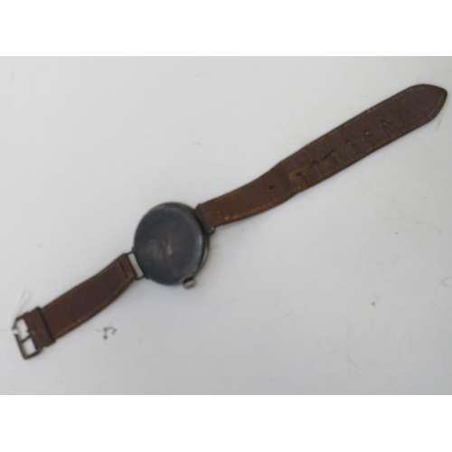 352 - A WW1 SILVER CASED HALF HUNTER TRENCH WRISTWATCH, with leather strap, visible dial Dia. .75 cm, case... 