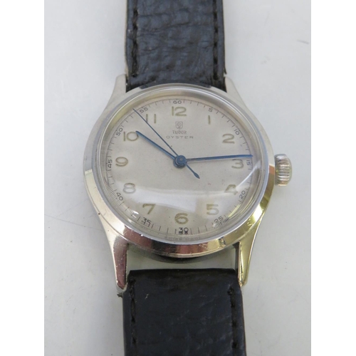 353 - A VINTAGE ROLEX TUDOR OYSTER WRISTWATCH, with leather strap, dial Dia. 2.5 cm