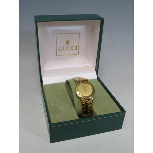 362 - A 1980 / 90'S LADIES GUCCI GOLD PLATED WRISTWATCH, with champagne coloured dial and Roman Numerals t... 