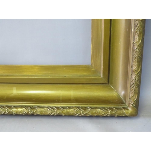38 - A 19TH CENTURY GOLD FRAME, with gold slip and leaf design to outer edge, having some restoration, fr... 