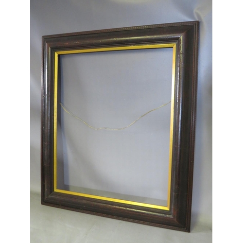 39 - A LATE 19TH . EARLY 20TH CENTURY EBONISED DUTCH FRAME, with gold slip, frame W 10 cm, slip rebate 62... 