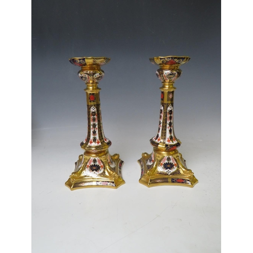 733 - A PAIR OF ROYAL CROWN DERBY IMARI PATTERN CANDLESTICKS, pattern no. 1128, H 26.5 cm