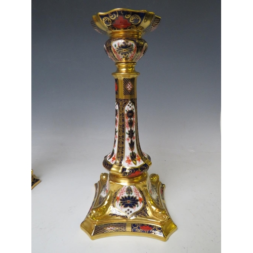 733 - A PAIR OF ROYAL CROWN DERBY IMARI PATTERN CANDLESTICKS, pattern no. 1128, H 26.5 cm