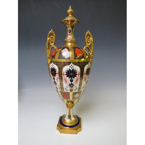 734 - A ROYAL CROWN DERBY IMARI PATTERN TWIN HANDLED OVOID PEDESTAL VASE AND COVER, pattern no. 1128, H 42... 