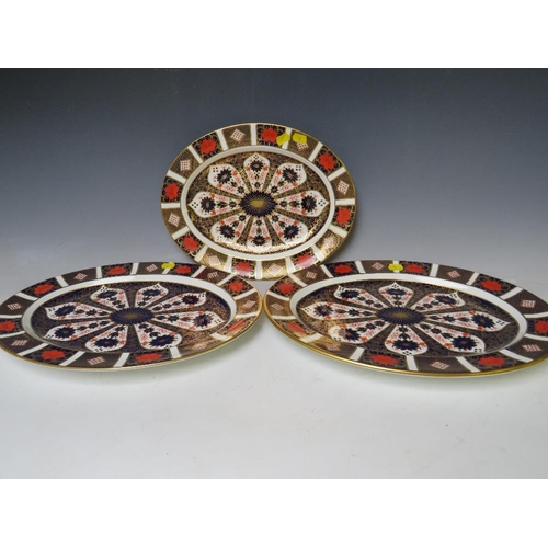 739 - THREE ROYAL CROWN DERBY IMARI MEAT SERVING PLATTERS, two approximately 41 cm at widest point and one... 