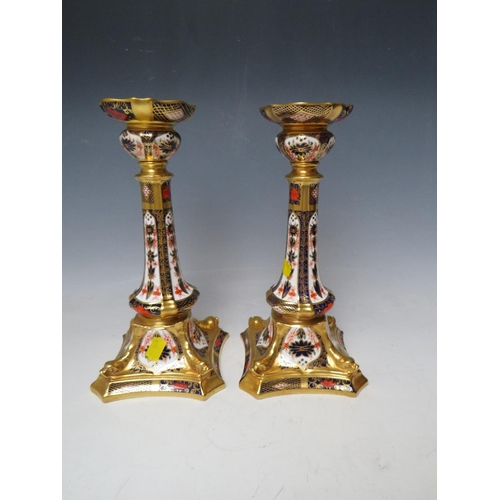 757 - A PAIR OF ROYAL CROWN DERBY OLD IMARI PATTERN CANDLESTICKS - ONE CANDLESTICK A/F, pattern no. 1128, ... 