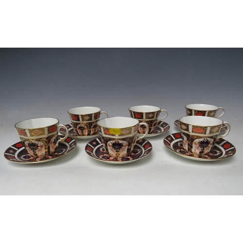 760 - SIX ROYAL CROWN DERBY IMARI PATTERN CUPS AND SAUCERS, saucers Dia 16 cm, 3 round cups H 7.5 cm and t... 