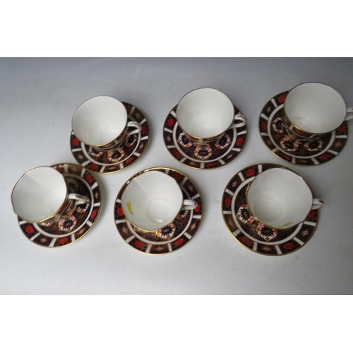 760 - SIX ROYAL CROWN DERBY IMARI PATTERN CUPS AND SAUCERS, saucers Dia 16 cm, 3 round cups H 7.5 cm and t... 