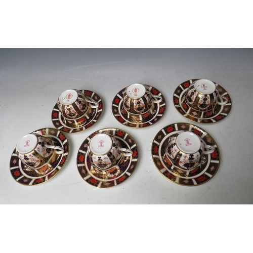 760 - SIX ROYAL CROWN DERBY IMARI PATTERN CUPS AND SAUCERS, saucers Dia 16 cm, 3 round cups H 7.5 cm and t... 