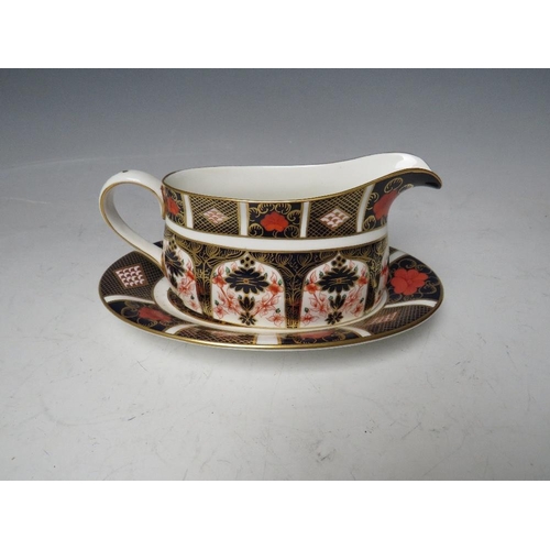 765 - A ROYAL CROWN DERBY IMARI PATTERN 1128 GRAVY / SAUCE BOAT AND STAND