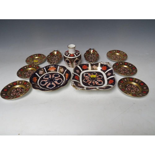 769 - ELEVEN ROYAL CROWN DERBY IMARI PATTERN ITEMS, to include a footed bowl - Dia. 18 cm, a round bowl -D... 