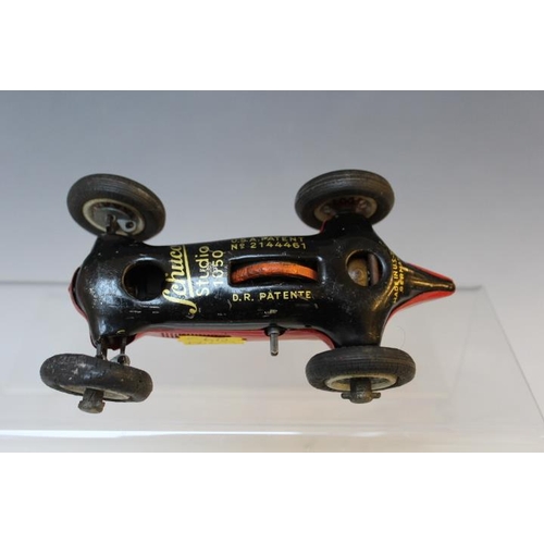 882 - A VINTAGE SCHUCO STUDIO 1050 TINPLATE CLOCKWORK SPORTS CAR,  L 13 cm