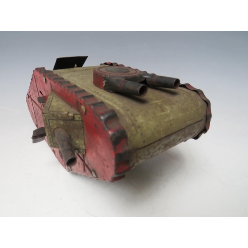 883 - A VINTAGE TINPLATE CLOCKWORK FIRST WORLD WAR TANK, with figure inside, L 24 cm