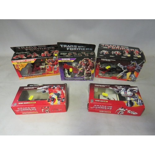 893 - FIVE BOXED HASBRO TRANSFORMERS TO INCLUDE SCATTERSHOT, Slag, Sideswipe, Jazz and Duocon Flywheels