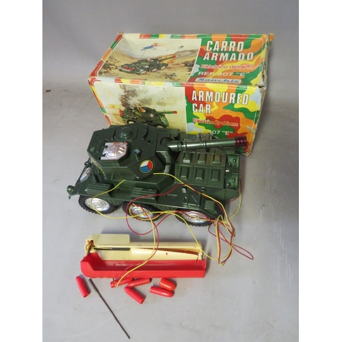 897 - A VINTAGE BOXED ELECTRICALLY DRIVEN ARMOURED CAR BY SANCHIS, a vintage battery operated Hawker Sidde... 