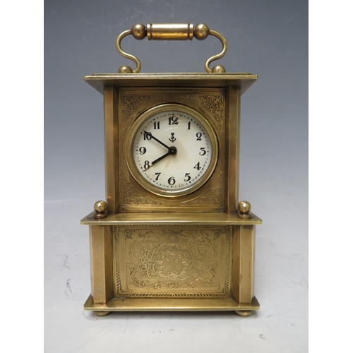 900 - A SMALL BRASS CASED MUSICAL ALARM CLOCK, playing Brahms 'Lullaby For Babies'