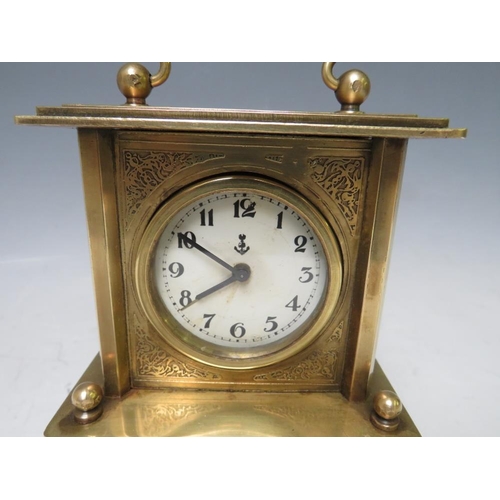 900 - A SMALL BRASS CASED MUSICAL ALARM CLOCK, playing Brahms 'Lullaby For Babies'