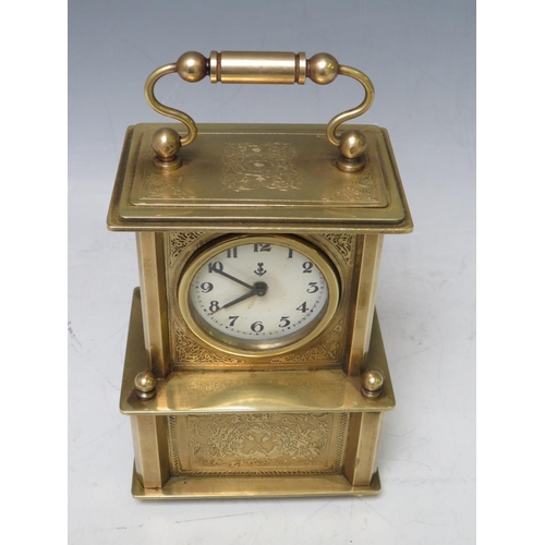 900 - A SMALL BRASS CASED MUSICAL ALARM CLOCK, playing Brahms 'Lullaby For Babies'