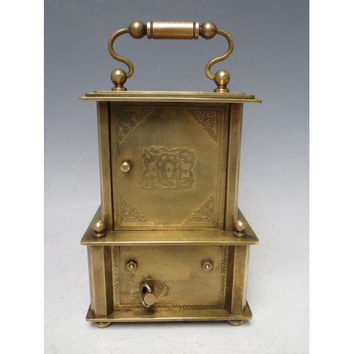 900 - A SMALL BRASS CASED MUSICAL ALARM CLOCK, playing Brahms 'Lullaby For Babies'