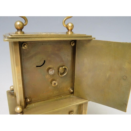 900 - A SMALL BRASS CASED MUSICAL ALARM CLOCK, playing Brahms 'Lullaby For Babies'