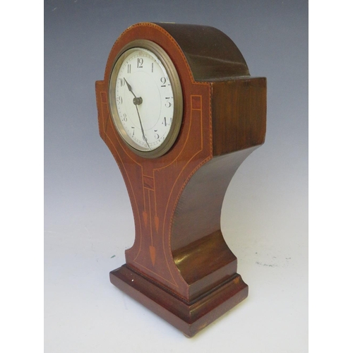 903 - AN EDWARDIAN MAHOGANY AND INLAID MANTLE CLOCK, with French movement, standing on four small gilt bun... 