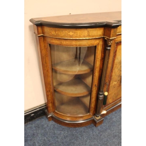 951 - A VICTORIAN WALNUT CROSSBANDED CREDENZA, the single panelled door with a continental oval porcelain ... 