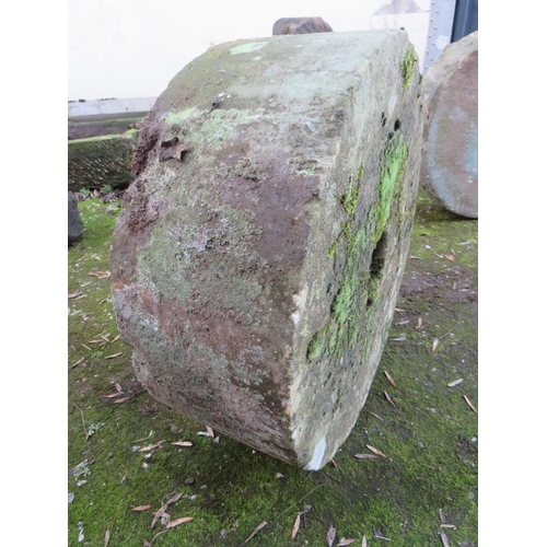 956 - AN ANTIQUE SANDSTONE MILL STONE , Dia. 67 cm