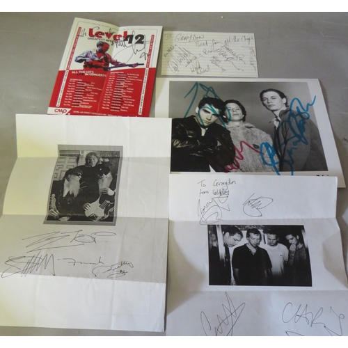 147 - A TRAY OF AUTOGRAPHS AND PHOTOGRAPHS, LETTERS, CARD AND PAPER OF POP GROUPS, to include Coldplay, Ge... 