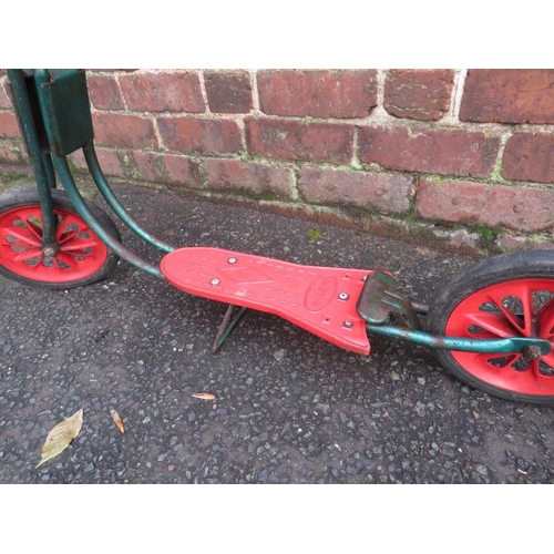 130 - A VINTAGE RALEIGH SCOOTER PLUS A VINTAGE POGO STICK (2)