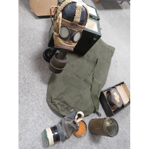 133 - BRITISH ARMY WIRELESS BATTERY BOX, WW2 FRENCH TC38 GAS RESPIRATOR & DISPLAY STAND AND TWO WW2 BRITIS... 