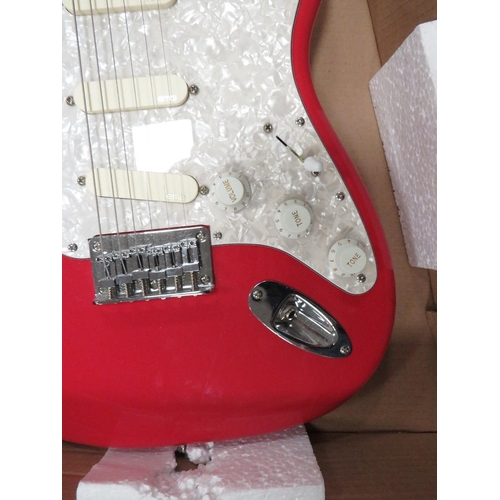 290 - A SQUIRE FENDER BULLET STRAT WITH THREE SINGLE COIL PICK UPS IN CHERRY RED FINISH