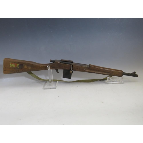 570 - A CHILDS ARMY CADET TRAINING RIFLE BY PARIS MANUFACTURING Co., together with a Rustler Laramie repea... 