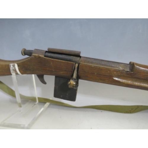 570 - A CHILDS ARMY CADET TRAINING RIFLE BY PARIS MANUFACTURING Co., together with a Rustler Laramie repea... 