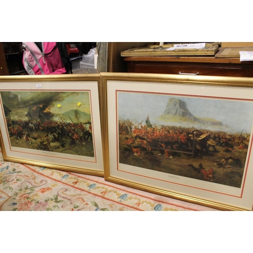 10 - TWO FRAMED AND GLAZED LIMITED EDITION  MILITARY PRINTS , DEFENCE OF ROOKES DRIFT AND ISANDHLWANA BOT... 