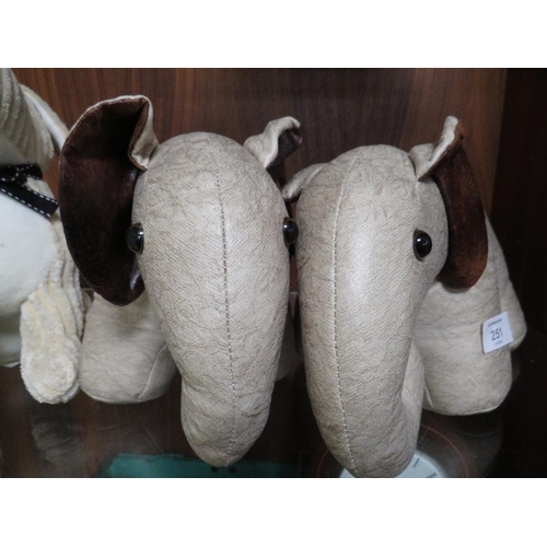 251 - FOUR ASSORTED  ANIMAL DOOR STOPS